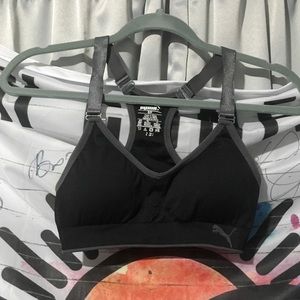 black and grey puma sports bra